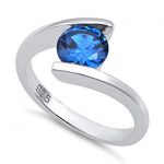 Tension ring with sapphire in sterling silver